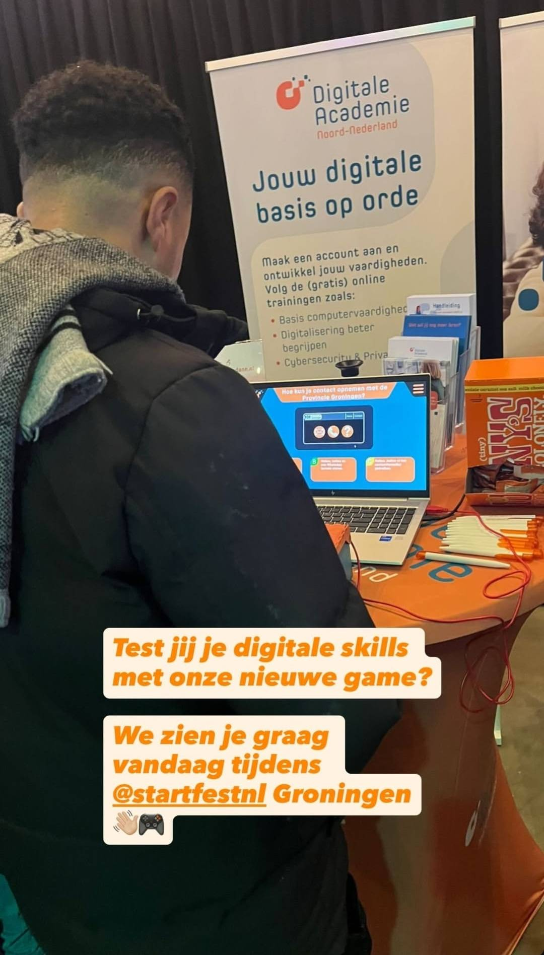 A person playing the DANN Box Quiz game